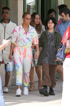 Miami, FL  - *EXCLUSIVE*  - Jennifer Lopez rocks a multicolored jumpsuit and matching Nike's with a Louis Vuitton purse as she goes out for a bite with her kids Emme and Max, and friends in Miami, Florida, while her new beau Ben Affleck relaxes in California.Pictured: Jennifer Lopez, Emme Maribel Muniz, Maximilian David MunizBACKGRID USA 9 JUNE 2021 BYLINE MUST READ: MiamiPIXX / BACKGRIDUSA: +1 310 798 9111 / usasales@backgrid.comUK: +44 208 344 2007 / uksales@backgrid.com*UK Clients - Pictures Containing ChildrenPlease Pixelate Face Prior To Publication*