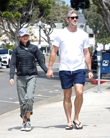 EXCLUSIVE: Renee Zellweger and Ant Anstead's relationship continues to go from strength to strength as the pair are pictured enjoying a relaxing day out together. The couple looked inseparable as they took a walk before going on a bike ride near his luxury beachfront home in Laguna Beach, CA. Bridget Jones’s Diary star Renee, 52, and the ‘Wheeler Dealers’ presenter, 42, took their relationship public after the English presenter recently finalized his divorce from ex-wife, Flip Or Flop star Christina Haack, 38. 28 Aug 2021 Pictured: Renée Zellweger and Ant Anstead. Photo credit: P&P / MEGA TheMegaAgency.com +1 888 505 6342 (Mega Agency TagID: MEGA782101_015.jpg) [Photo via Mega Agency]