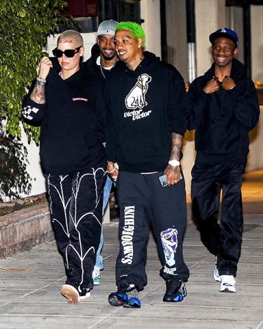 Beverly Hills, CA - *EXCLUSIVE* A camera-shy Amber Rose reveals a new tattoo that reads “Bash Slash”, a tribute to her kids Sebastian and Slash while out for dinner with boyfriend Alexander Edwards and friends at Matsuhisa in Beverly Hills. Alexander complemented Amber's ink with the kid's birthdays separated by a lightning bolt tattooed across his forehead.Pictured: Amber Rose, Alexander EdwardsBACKGRID USA 17 FEBRUARY 2020 USA: +1 310 798 9111 / usasales@backgrid.comUK: +44 208 344 2007 / uksales@backgrid.com*UK Clients - Pictures Containing ChildrenPlease Pixelate Face Prior To Publication*