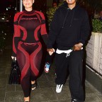Amber Rose and boyfriend Alexander "AE" Edwards kiss for the fans after dinner in Beverly Hills