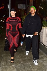Los Angeles, CA  - Amber Rose and Alexander "AE" Edwards kiss for the cameras after dinner with a friend at Avra in Beverly Hills. The What Happened Last Night actress kept it simple in a black and red outfit. The leggings and long sleeve shirt had the same pattern and showed off her toned curves as her baby daddy rocked his signature neon green hair and a black sweatsuit.

Pictured: Amber Rose, Alexander "AE" Edwards

BACKGRID USA 19 DECEMBER 2019 

USA: +1 310 798 9111 / usasales@backgrid.com

UK: +44 208 344 2007 / uksales@backgrid.com

*UK Clients - Pictures Containing Children
Please Pixelate Face Prior To Publication*
