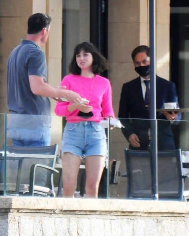 Palma de Mallorca, SPAIN  - *EXCLUSIVE*  - The Cuban-Spanish actress Ana De Armas spotted enjoying a spot of breakfast with friends and a mystery man at the table at Palma De Mallorca in Spain.  Ana appears to be in good spirits and moving on amid news that her ex Ben Affleck is seeing Jennifer Lopez.   Ana who celebrated her 33rd birthday recently was seen in good spirits after a rather turbulent time earlier in the year regarding her love life with the American Actor Ben Affleck as the pair ended their year-long relationship.  Ben seems to have forgotten all about Ana after recent pictures emerged of a reunion with his ex Jennifer Lopez sparking rumors that the couple may be back on.  Pictured: Ana de Armas  BACKGRID USA 13 MAY 2021   USA: +1 310 798 9111 / usasales@backgrid.com  UK: +44 208 344 2007 / uksales@backgrid.com  *UK Clients - Pictures Containing Children Please Pixelate Face Prior To Publication*