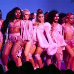 Ariana Grande, center, performs a medley at the 62nd annual Grammy Awards, in Los Angeles 62nd Annual Grammy Awards - Show, Los Angeles, USA - 26 Jan 2020