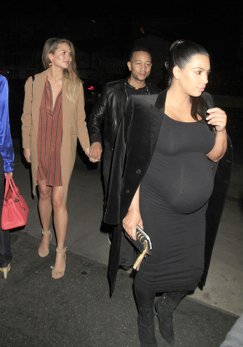 Kim Kardashian, Chrissy Teigen, John Legend & Kanye West dine out together as the pregnant beauties put their baby bumps on display.