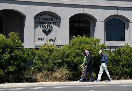 Synagogue members walk outside of the Chabad of Poway Synagogue, in Poway, Calif. Several people were injured in a shooting at the synagogue
Synagogue Shooting-California, Poway, USA - 27 Apr 2019