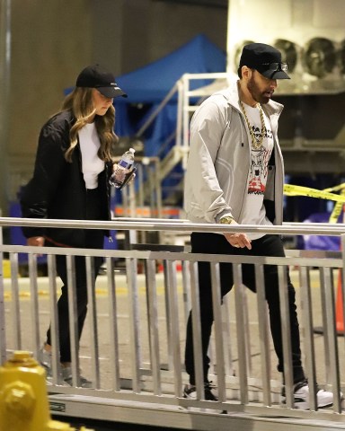 Los Angeles, CA - *EXCLUSIVE* - An Extremely rare sighting of rapper Eminem with his daughter Hailie Jade as they depart rehearsals for the 2022 Rock and Roll Hall of Fame. Eminem and Hailie are typically never photographed together. Eminem who just turned 50 on October 17 was seen dressed causally as he left rehearsals with his oldest daughter. The rapper also shares daughter, Alaina Scott and son Stevie Laine Scott with his ex-wife, Kim Scott. Eminem will be inducted into the hall of fame today, November 5th along with Pat Benatar and Neil Giraldo, Duran Duran, Eurythmics, Dolly Parton, Lionel Richie, and Carly Simon among others being honored. Pictured: Eminem, Hailie Jade BACKGRID USA 4 NOVEMBER 2022 BYLINE MUST READ: Flash / BACKGRID USA: +1 310 798 9111 / usasales@backgrid.com UK: +44 208 344 2007 / uksales@backgrid.com *UK Clients - Pictures Containing Children Please Pixelate Face Prior To Publication*