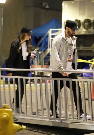 Los Angeles, CA - *EXCLUSIVE* - An Extremely rare sighting of rapper Eminem with his daughter Hailie Jade as they depart rehearsals for the 2022 Rock and Roll Hall of Fame. Eminem and Hailie are typically never photographed together. Eminem who just turned 50 on October 17 was seen dressed causally as he left rehearsals with his oldest daughter. The rapper also shares daughter, Alaina Scott and son Stevie Laine Scott with his ex-wife, Kim Scott. Eminem will be inducted into the hall of fame today, November 5th along with Pat Benatar and Neil Giraldo, Duran Duran, Eurythmics, Dolly Parton, Lionel Richie, and Carly Simon among others being honored. Pictured: Eminem, Hailie Jade BACKGRID USA 4 NOVEMBER 2022 BYLINE MUST READ: Flash / BACKGRID USA: +1 310 798 9111 / usasales@backgrid.com UK: +44 208 344 2007 / uksales@backgrid.com *UK Clients - Pictures Containing Children Please Pixelate Face Prior To Publication*