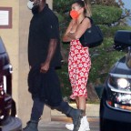 Hailey Bieber wears a red floral dress as she dines at Nobu Malibu