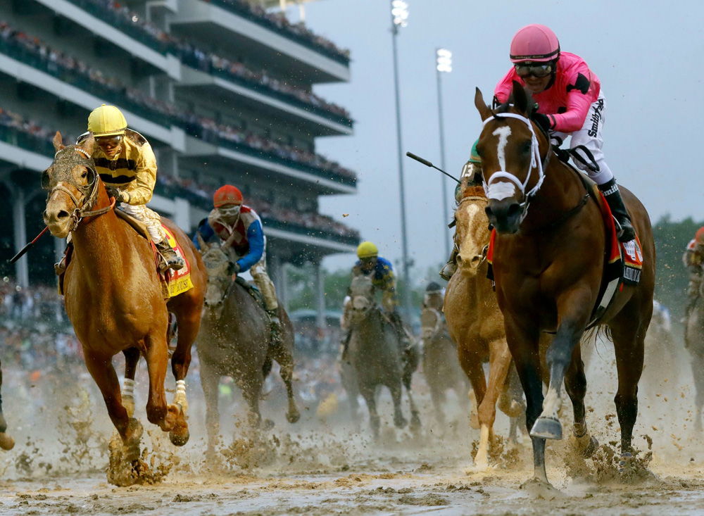 Luis Saez rides Maximum Security, right, across the finish line first against Flavien Prat on Country House during the 145th running of the Kentucky Derby horse race at Churchill Downs, in Louisville, Ky. Country House was declared the winner after Maximum Security was disqualified following a review by race stewards
Kentucky Derby Horse Racing, Louisville, USA - 04 May 2019