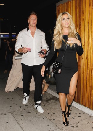 Kim Zolciak and his family leave 'The Nice Guy' lounge in Los Angeles after having dinner together. Pictured: Kroy Biermann and Kim Zolciak,Kroy Biermann Kim Zolciak Ref : SPL1324357 240716 NON EXCLUSIVE Photo by: SplashNews.com Splash News and Pictures Los Angeles: 310-821-2666 New York: 212-619-2666 London: 0207 644 7656 Milan: 02 4399 8577 photodesk@splashnews.com World Rights