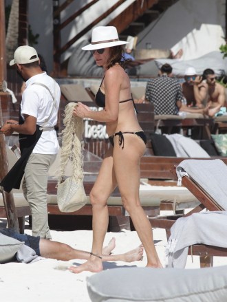EXCLUSIVE: Real Housewives of New York star Luann de Lesseps shows off her bikini body as she hits the beach in Tulum, Mexico.  02 Jan 2022 Pictured: Luann de Lesseps.  Photo credit: MEGA TheMegaAgency.com +1 888 505 6342 (Mega Agency TagID: MEGA817296_033.jpg) [Photo via Mega Agency]