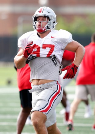 Ohio State defensive end Nick Bosa runs through a drill during NCAA college football practice in Columbus, Ohio
Ohio State football, Columbus, USA - 18 Aug 2018