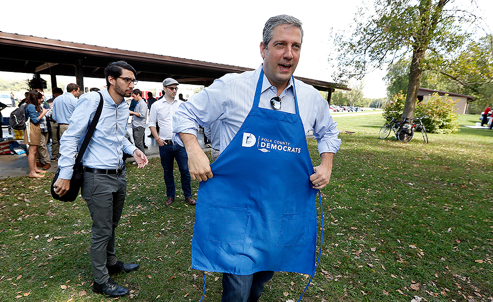 U.S. Rep. Tim Ryan, D-Ohio, puts his apron on before working the grill at the Polk County Democrats Steak Fry, in Des Moines, Iowa
Iowa Democrat, Des Moines, USA - 30 Sep 2017