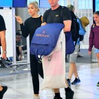 EXCLUSIVE: Tarek El Moussa and Heather Rae Young arrive into LAX