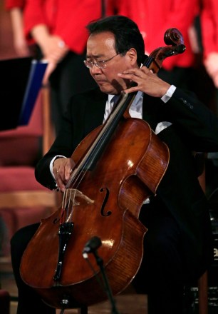 Yo-Yo Ma Grammy award winning cellist Yo-Yo Ma performs during an interfaith healing service at the Cathedral of the Holy Cross in Boston, for victims of Monday's Boston Marathon explosions
Obama Boston Marathon Explosions, Boston, USA