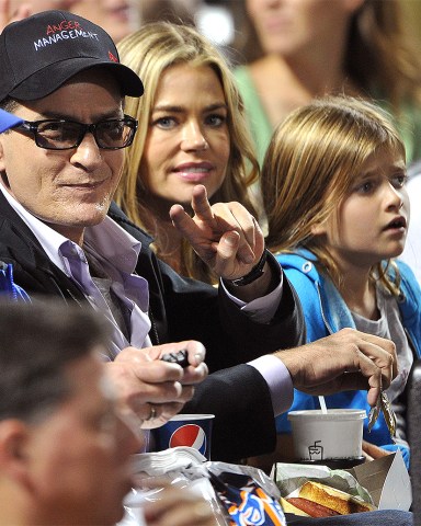 Actor Charlie Sheen, ex-wife Denise Richards and their two daughters promote Charlie's new television series Anger Management during a baseball game between the New York Yankees and New York Mets on June 23, 2012 at CitiField in the Queens borough of New York City.  Pictured: Charlie Sheen Ref: SPL1178029 240612 NON-EXCLUSIVE Picture by: SplashNews.com  Splash News and Pictures USA: +1 310-525-5808 London: +44 (0)20 8126 1009 Berlin: +49 175 3764 166 photodesk@splashnews.com  World Rights