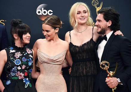 Maisie Williams, from left, Emilia Clarke, Sophie Turner, and Kit Harington winners of the award for outstanding drama series for Game of Thrones pose in the press room at the 68th Primetime Emmy Awards, at the Microsoft Theater in Los Angeles
2016 Primetime Emmy Awards - Press Room, Los Angeles, USA