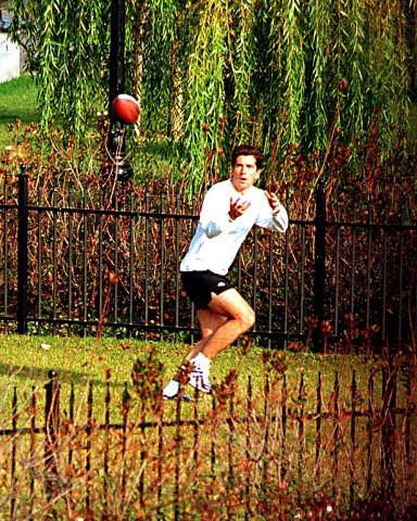 John Kennedy Jr playing football in Central Park, New York, America - Feb 1999 JOHN F. KENNEDY JNR. RETRO