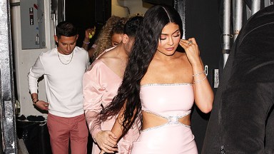 Kylie Jenner Wears Red Catsuit + Clear Sandals for LA Clubbing Attire