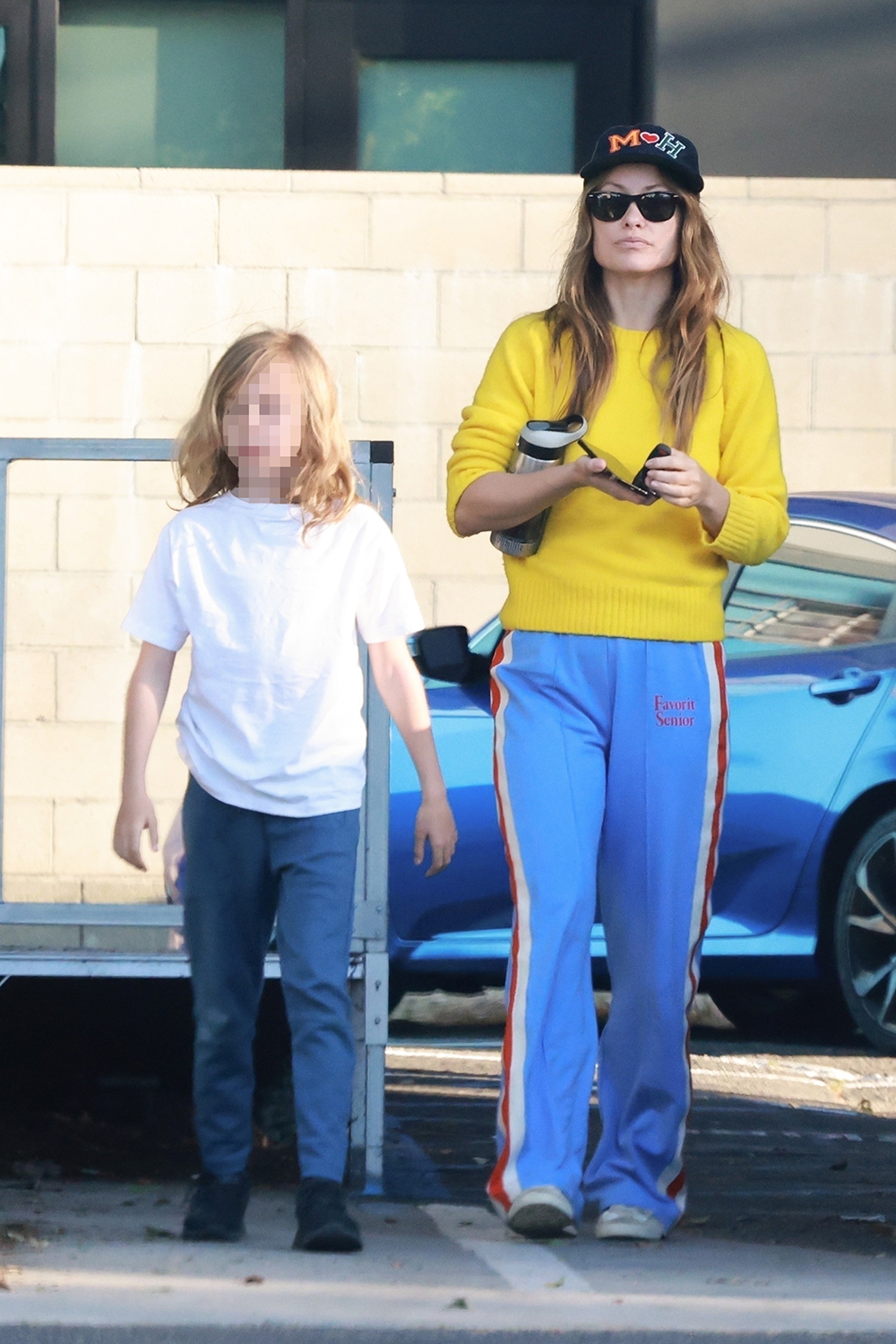 *EXCLUSIVE* Olivia Wilde spends time with her son at ice cream parlor followed by soccer practice