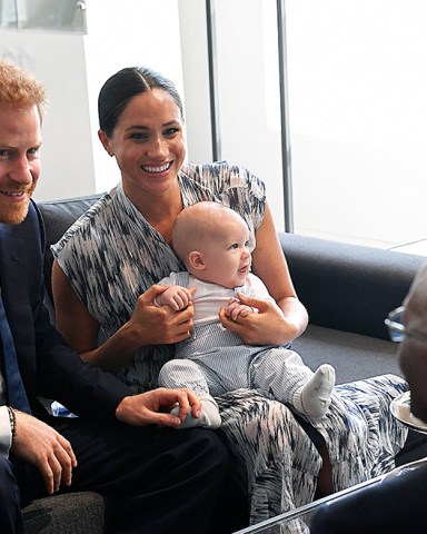 Prince Harry and Meghan Duchess of Sussex, holding their son Archie Harrison Mountbatten-Windsor, meet Archbishop Desmond Tutu at the Desmond & Leah Tutu Legacy Foundation in Cape Town, South Africa
Prince Harry and Meghan Duchess of Sussex visit to Africa - 25 Sep 2019