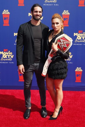 Seth Rollins and Becky Lynch arrive for the 2019 MTV Movie & TV Awards at the Barker Hangar, Santa Monica, California, USA, 15 June 2019. The movies are nominated by producers and executives from MTV and the winners are chosen online by the general public.
Arrivals - MTV Movie & TV Awards 2019, Washington, USA - 15 Jun 2019
