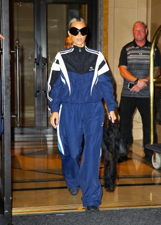 New York City, NY  - Kim Kardashian departs The Ritz-Carlton Hotel in New York City wearing a blue Balenciaga tracksuit and sunglasses.Pictured: Kim KardashianBACKGRID USA 13 JULY 2022 USA: +1 310 798 9111 / usasales@backgrid.comUK: +44 208 344 2007 / uksales@backgrid.com*UK Clients - Pictures Containing ChildrenPlease Pixelate Face Prior To Publication*