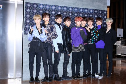 Members of South Korean boy band Stray Kids, often abbreviated to SKZ, attend the filming session for an episode of the music program "M Countdown" in Seoul, South Korea, 1 November 2018.  (Imaginechina via AP Images)