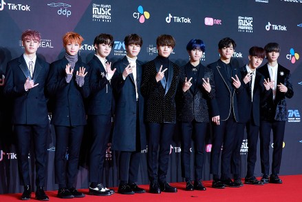 Members of South Korean boy band Stray Kids pose they arrive at the red carpet for the 2018 Mnet Asian Music Awards (MAMA) Premiere in Seoul, South Korea, 10 December 2018.  (Imaginechina via AP Images)