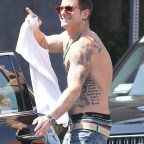 *EXCLUSIVE* Cameron Douglas can't help but go shirtless after hanging out with a friend in L.A.