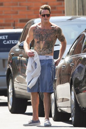 Los Angeles, CA  - *EXCLUSIVE*  - Actor, Cameron Douglass shows off his tattoos and ripped physique during a grocery run at Bristol Farms in Los Angeles. The actor steps out of his ride shirtless but remembers to throw on a shirt before heading inside the supermarket.Pictured: Cameron DouglasBACKGRID USA 28 MAY 2019 BYLINE MUST READ: W Blanco / BACKGRIDUSA: +1 310 798 9111 / usasales@backgrid.comUK: +44 208 344 2007 / uksales@backgrid.com*UK Clients - Pictures Containing ChildrenPlease Pixelate Face Prior To Publication*