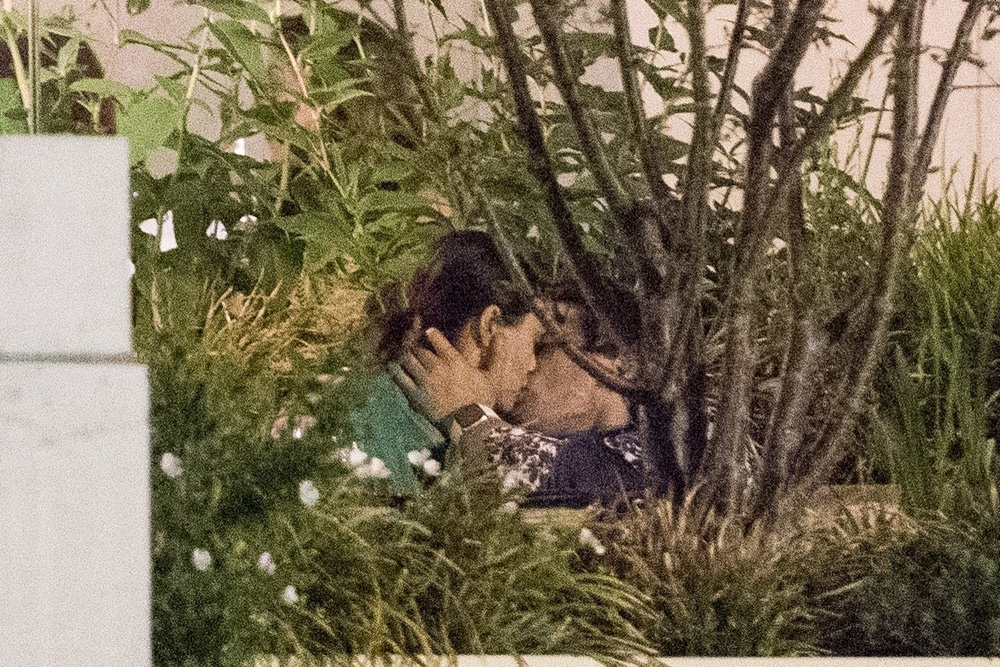 *EXCLUSIVE* Riverdale stars Camila Mendes and Charles Melton put on sweet PDA display as they dine near the Eiffel Tower