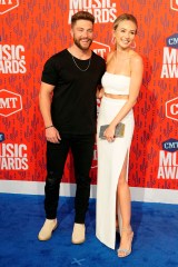 Chris Lane, Lauren Bushnell. Chris Lane, left, and Lauren Bushnell arrive at the CMT Music Awards, at the Bridgestone Arena in Nashville, Tenn
2019 CMT Music Awards - Arrivals, Nashville, USA - 05 Jun 2019