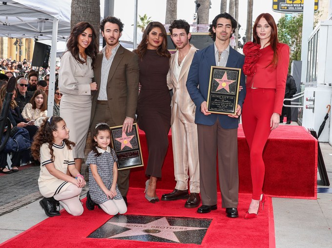 Jonas Brothers & Wives At Walk of Fame Ceremony