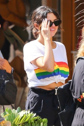 Puerto Vallarta, MEXICO  - *EXCLUSIVE*  - Singer and Actress, Selena Gomez is shopping with her friends at Sayulita Vilage while on vacation in Punta de Mita Mexico. Selena appeared to be in good spirits as she explored what Mexico had to offer. The former Disney star kept her attire light and fun as she sported a white Tee with a rainbow on it and black shorts with some stylish shades.Pictured: Selena GomezBACKGRID USA 30 JUNE 2019 USA: +1 310 798 9111 / usasales@backgrid.comUK: +44 208 344 2007 / uksales@backgrid.com*UK Clients - Pictures Containing ChildrenPlease Pixelate Face Prior To Publication*