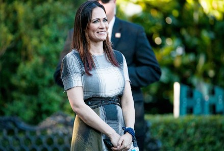 Stephanie Grisham, spokeswoman for first lady Melania Trump, watches as President Donald Trump and the first lady greet attendees during the annual Congressional Picnic on the South Lawn, in Washington
Trump, Washington, USA - 21 Jun 2019
