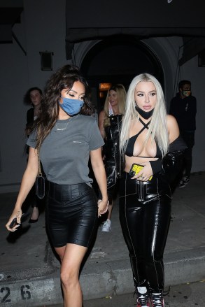 West Hollywood, CA  - Tana Mongeau and her rumored new “Too Hot To Handle” girlfriend Francesca Farago enjoy another hot date night along with friends Cole Carrigan and others at Craig's restaurant in West Hollywood. The “Two Hot To Handle” Star Francesca just broke up with her boyfriend, Harry Jowsey, a month ago, but seems to have found a new love interest in Tana. The two were inseparable as they walked out of the restaurant with their hands clinched tightly holding each other. The two were fashionably dressed as Tana showed off her toned abs and cleavage in a black leather bra paired with black leather pants, a black crocodile print jacket, and red/black/white Jordan 1’s sneakers. Francesca donned a gray Balenciaga shirt with tight black shorts that showed off her toned sleek legs and black clog heels. Both wore face masks although Tana’s mask was under her cheek. Tana also got a lil frisky as she just couldn’t let go of her girlfriend while hugging her from the backside. When asked about their relationship, Tana smiled and got in the back seat with her new beau.Pictured: Tana Mongeau, Francesca FaragoBACKGRID USA 6 JULY 2020 USA: +1 310 798 9111 / usasales@backgrid.comUK: +44 208 344 2007 / uksales@backgrid.com*UK Clients - Pictures Containing ChildrenPlease Pixelate Face Prior To Publication*