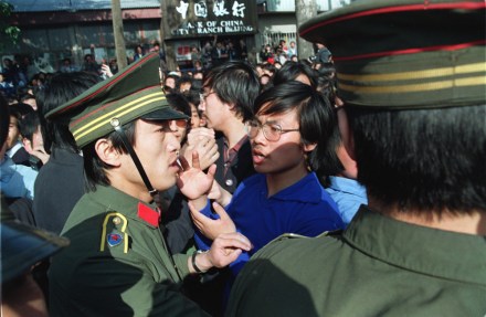 A Beijing University student leader argues with a policeman about the students' right to march as they are told not to march when emerging from their campus in Beijing, China, on . Students from more than forty universities march to Tiananmen Square in protest of the April 26 editorial in the Communist Party newspaper despite warnings of violent suppression
TAINANMEN STUDENT DEMONSTRATION, BEIJING, China