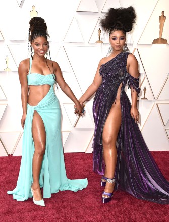 Halle Bailey, left, and Chloe Bailey arrive at the Oscars, at the Dolby Theater in Los Angeles 94th Academy Awards - Arrivals, Los Angeles, United States - 27 Mar 2022