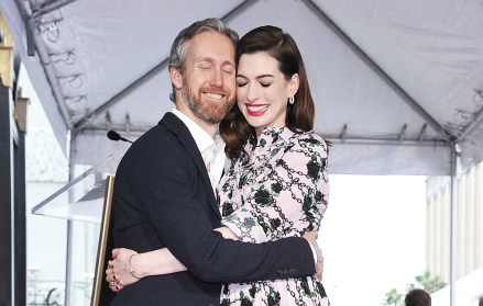 Anne Hathaway, Adam Shulman. Actress Anne Hathaway, right, and her husband Adam Shulman hug following a ceremony honoring Hathaway with a star on the Hollywood Walk of Fame, in Los Angeles
Anne Hathaway Honored with a Star on the Hollywood Walk of Fame, Los Angeles, USA - 09 May 2019