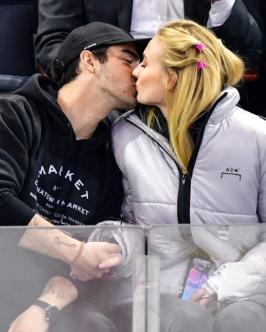 Joe Jonas and Sophie TurnerCelebrities at Detroit Red Wings v New York Rangers, NHL ice hockey match, New York, USA - 19 Mar 2019At one point Sophie impressed by the crowd by quickly drinking (and spilling) a glass of wine while being put on the Jumbotron