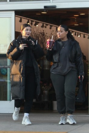 Calabasas, CA  - *EXCLUSIVE*  - Kylie Jenner chats it up with new BFF Heather Sanders as she goes grocery shopping at Apricot Lane Farms. Kylie flashed a massive ring on her left finger that looked very much like an engagement ring. Kylie looked comfortably warm with full length parka with sweats and clean white trainers while her bodyguard carried out her groceries. Shot on 02/07/19.

Pictured: Kylie Jenner

BACKGRID USA 9 FEBRUARY 2019 

USA: +1 310 798 9111 / usasales@backgrid.com

UK: +44 208 344 2007 / uksales@backgrid.com

*UK Clients - Pictures Containing Children
Please Pixelate Face Prior To Publication*