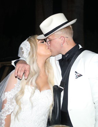 Jake Paul and Tana Mongeau’s giant wedding extravaganza at the infamous Graffiti Mansion in Las Vegas. The YouTuber’s met in late April, then right after the two got engaged at Mongeau's 21st birthday party making it announced at the video convention VidCon. Paul gifted her with a $124,000 Mercedes G Wagon and the ring the diamond-encrusted ring the couple got engaged with is fake and it reportedly retails for $125. Their ceremony was held at the Graffiti Mansion, that often gets spray painted to promote things like the ever popular brand “Supreme”. The event, as well as the after party held at a separate location called the “Sugar Factory”, was filmed by MTV and aired for YouTube. 28 Jul 2019 Pictured: Jake Paul Tana Mongeau. Photo credit: APEX / MEGA TheMegaAgency.com +1 888 505 6342 (Mega Agency TagID: MEGA474814_001.jpg) [Photo via Mega Agency]