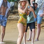 Katy Perry Shoots A Music Video With A Heavily-tattooed Male Mode In A Yellow One-piece Swim Suit In Hawaii
