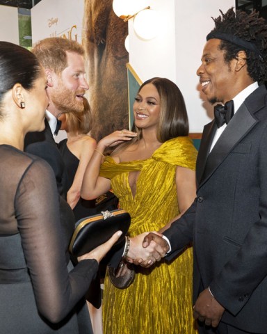 Britain's Prince Harry, Duke of Sussex (3rd L) and Britain's Meghan, Meghan Duchess of Sussex (2nd L) meet cast and crew, including US singer-songwriter Beyonce Knowles (C) and her husband, US rapper Jay Z (R) as they attend the European premiere of the film The Lion King.
'The Lion King' film premiere, London, UK - 14 Jul 2019