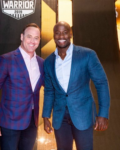 AMERICAN NINJA WARRIOR -- "L.A. Finals" -- Pictured: (l-r) Matt Iseman, Akbar Gbajabiamila -- (Photo by: Lara Solanki/NBC)