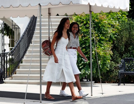 Malia Obama, left, and Sasha Obama, right, walk from the White House to board Marine One
President Obama, the White House, Washington DC, USA - 06 Aug 2016
Malia Obama, left, and Sasha Obama, right, walk from the White House, in Washington, to board Marine One, soon to be followed by their parents President Barack Obama and first lady Michelle Obama, en route to Andrews Air Force Base, Md., and on to Martha's Vineyard for a family vacation