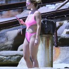 *EXCLUSIVE* Rita Ora is seen looking pretty in pink as she took a dip in Sydney Harbour during an outing on Sunday