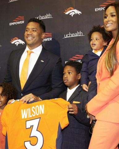 Denver Broncos new starting quarterback Russell Wilson, second from left, is joined for a photograph by his daughter Sienna, left, sons Future and Win and wife Ciara after a news conference, at the team's headquarters in Englewood, Colo Broncos Wilson Football, Englewood, United States - 16 Mar 2022