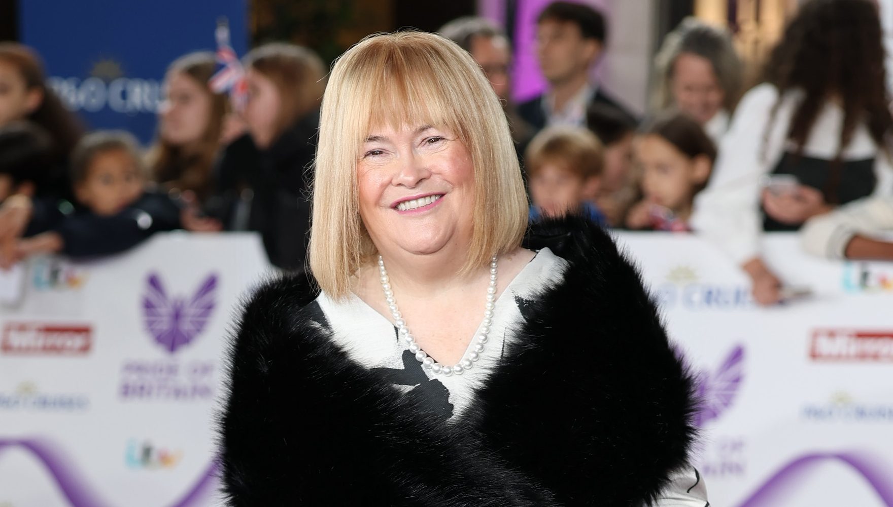 Susan Boyle Then & Now: Photos of the Singer Through the Years